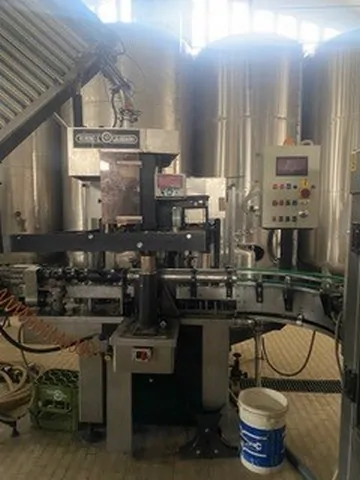Used Robino & Galandrino Sparkling Wine Wirehooder HJ 61 for wine bottling lines