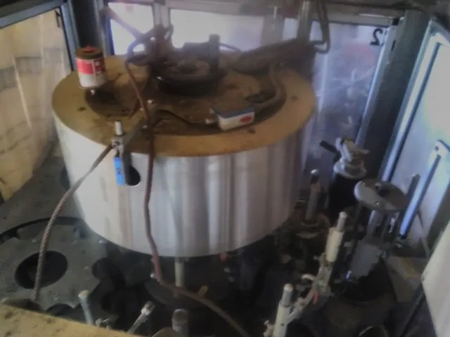 Used P.E. UNIVERSAL 9t/540/3S-3E. Wine Labelling Machine EA 235 for wine bottling lines