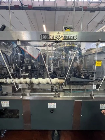 Used Robino & Galandrino Single-stage Z 12 T Wine Capsuling Machine BC 399 for wine bottling lines