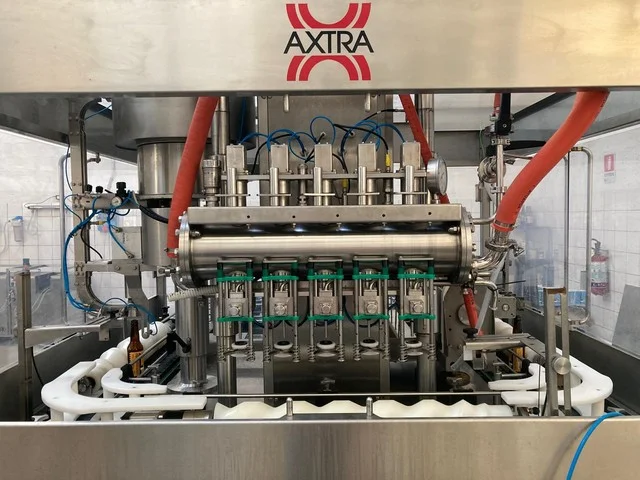 Used Axtra Miniline L-SA1 / L-G5 / L-IV5 / L-CW1 bottling machine Wine Filling Monoblock QT 772 for wine bottling lines