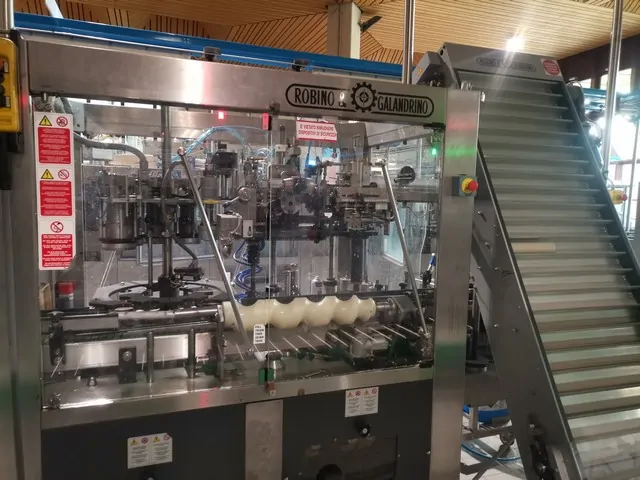 Used Robino & Galandrino 2008 Wine Capsuling Machine BC 372 for wine bottling lines