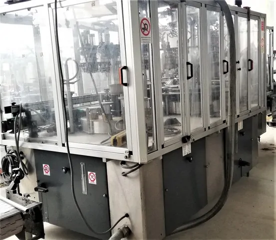 Used Robino & Galandrino Wine Capsuling Machine BC 145 for wine bottling lines
