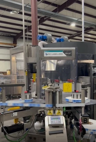 Used P.E. Simpl-Cut Wine Labelling Machine EA 676 for wine bottling lines